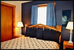 Rest comfortably in the Blue Duck Cabin-Suite’s Private Bedroom