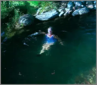 RV camper cooling off in the Mountain View RV Park swimming hole