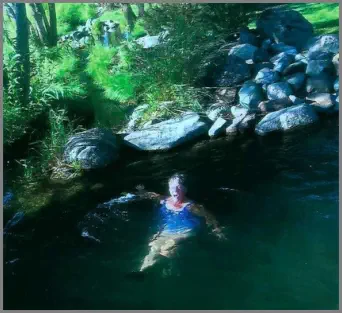 RV camper cooling off in the Mountain View RV Park swimming hole