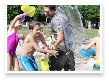 Water fight during a Family Getaway at the Mountain View Motel - RV Park.