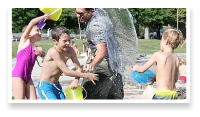 Water fight during a Family Getaway at the Mountain View Motel - RV Park.