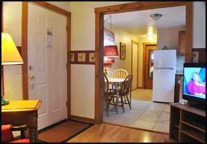 The Red Rooster Suite’s kitchen is outfitted with stove, microwave, refrigerator and cookware 