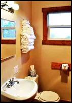 Freshen up in the Red Rooster Cabin-Suite’s bathroom
