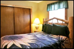Sleep comfortably on the queen bed in the Sunflower Suite bedroom in Joseph, Oregon.