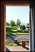 View the Wildflower Garden, Tepees and Wallowa Mountain scenery from the Mountain Lakes Room near Wallowa Lake